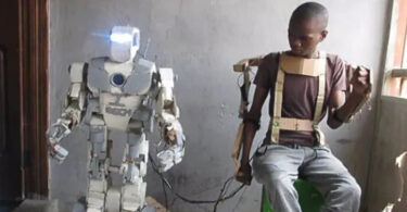 So Talented! 17 years old Nigerian boy invents robot using exoskeleton remote control (Video)